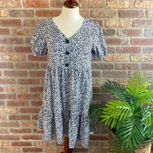 Shein small 100 polyester white baby doll dress with black dots.